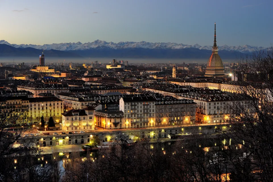 Turin’s Mole Antonelliana, Po River and snow-covered Alps at dusk from Monte dei Cappuccini