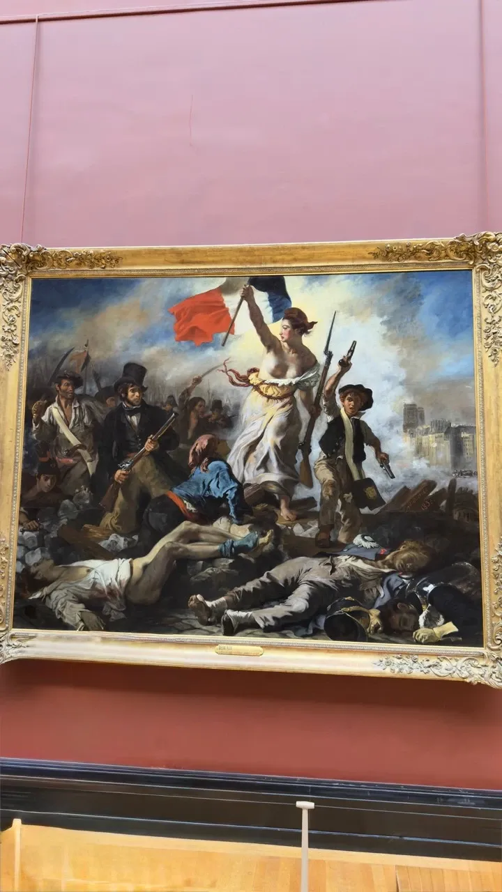 フランスの三色旗を掲げる女性を描いたドラクロワの民衆を導く自由の女神